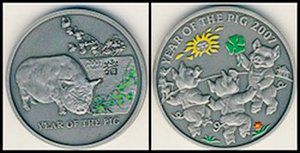 Певые монеты Ниуэ с представителями восточного гороскопа